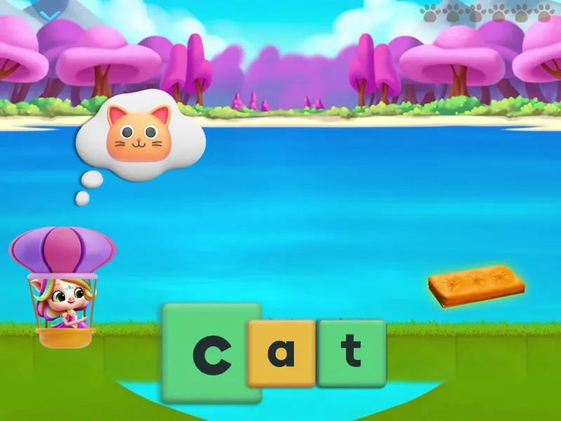 Spelling game: a child builds the word cat from letter tiles